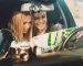 happy-smiling-couple-vacation-sitting-together-car-closely-studying-road-map-hands_129180-2548